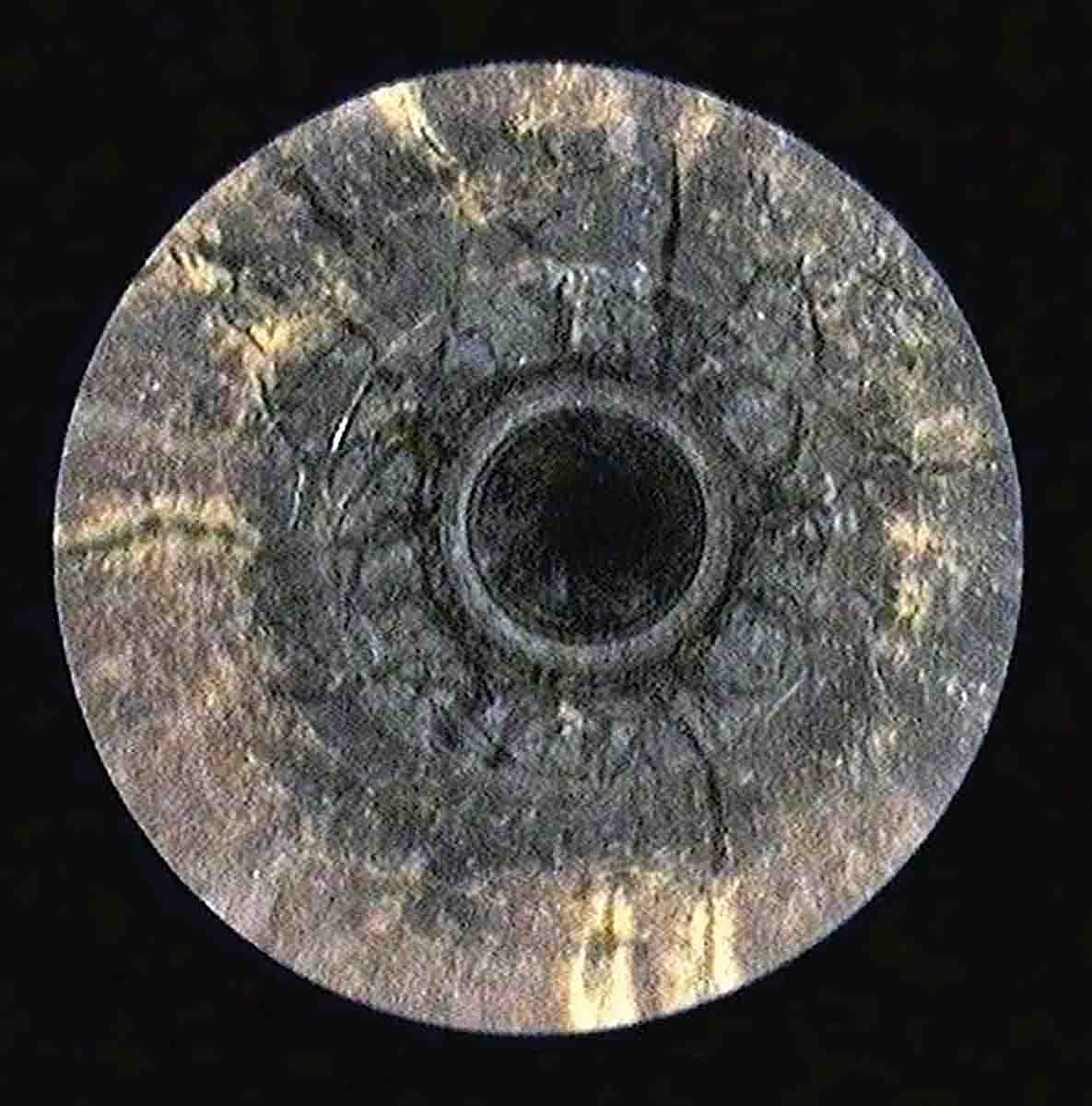 Photo taken through a Hawkeye Borescope of a highly eroded chamber throat.